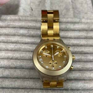 Swatch gold watch